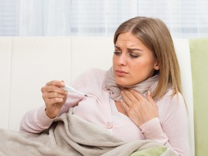 Woman is having sore throat