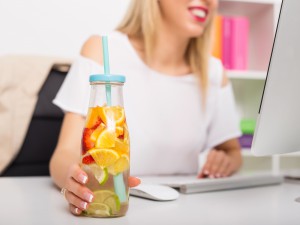 Woman with fruit water