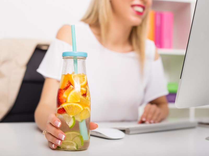 Woman with fruit water