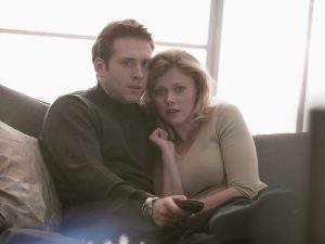 Couple sitting on couch