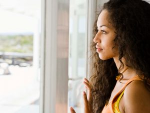 Woman looking out the window