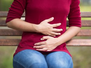 Woman with stomach ache