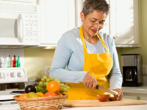 Mature woman cooking