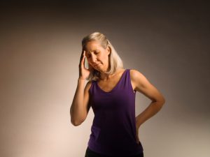 Mature woman with pain