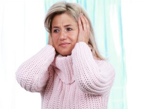 Woman with tinnitus