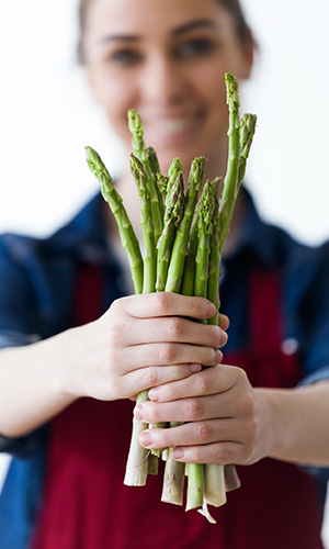 Woman with asparagus