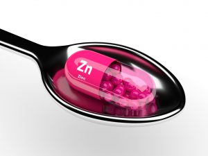 Zinc capsule in spoon