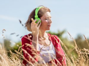 Woman listening to music outside