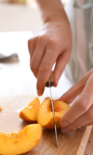 Cutting peaches