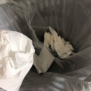 Toss tissues in waste basket